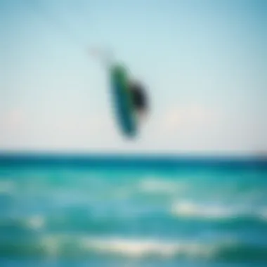 Advanced Air Foil Maneuver in Action A kiteboarder performing an advanced air foil maneuver above crystal-clear waters