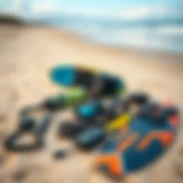 Essential kiteboarding gear laid out on a sandy beach
