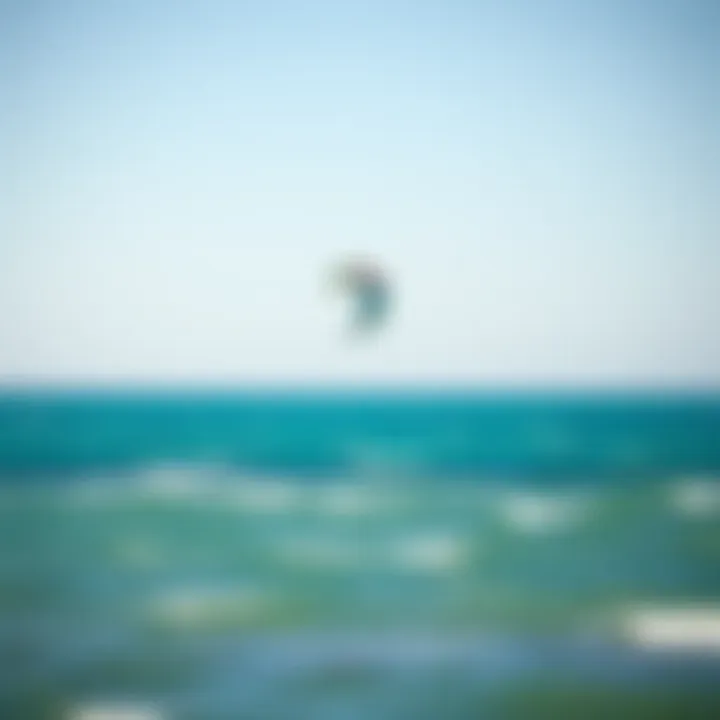 Kite in Action Above the Ocean A kite gliding through the air above azure waters