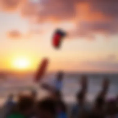 A picturesque sunset backdrop as kiteboarders engage in a lively community event