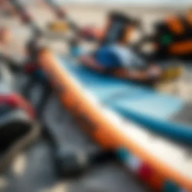 Essential Kitesurfing Gear A close-up of professional kitesurfing gear laid out on the beach