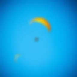 Vibrant kites soaring in a clear blue sky