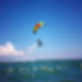 Vibrant kiteboard soaring through the sky above Crystal River