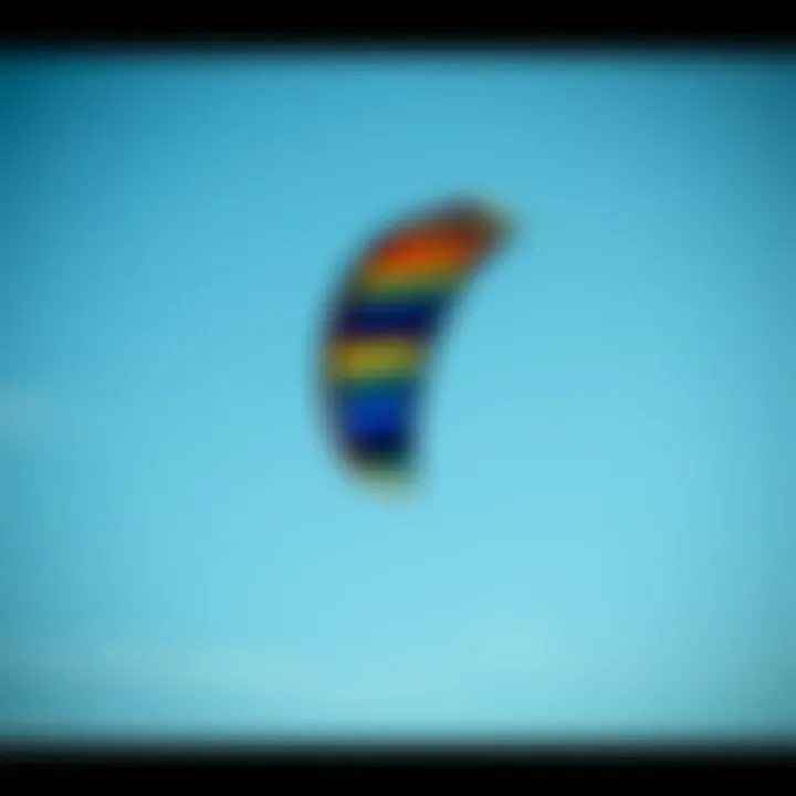 Kite Aerodynamics A colorful kite soaring high against a clear blue sky, showcasing aerodynamics and design.