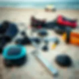Key Components of Kiteboarding Gear Essential kiteboarding gear laid out on a sandy beach