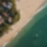 Aerial view of Cabarette Beach showcasing kiteboarders in action