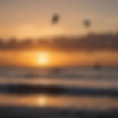 Stunning sunset over Cabarette Beach with kiteboarding silhouettes