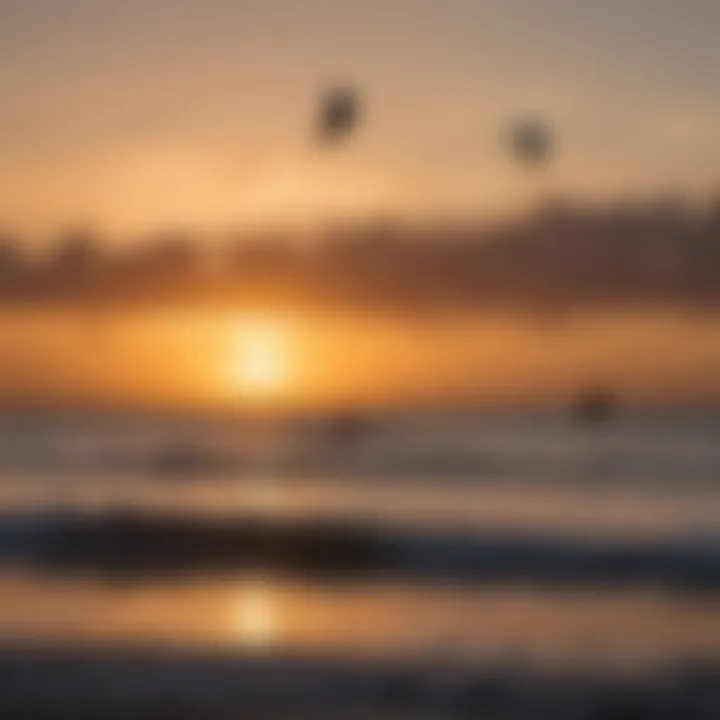 Stunning sunset over Cabarette Beach with kiteboarding silhouettes
