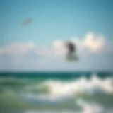 Kiteboarding at Coconut Bay Beach Kiteboarder soaring above the waves at Coconut Bay Beach