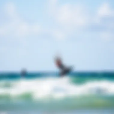 A serene beach scene with kiteboarders enjoying the waves