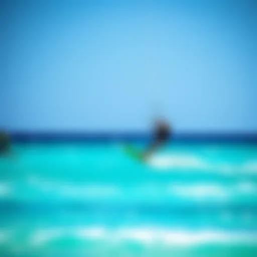 Kite surfer gliding over turquoise waters