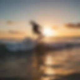 Kitesurfers riding the waves at sunset