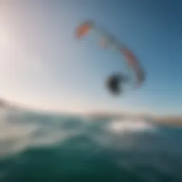 A breathtaking view of a kitesurfer gliding over the Mediterranean waters of Sicily.