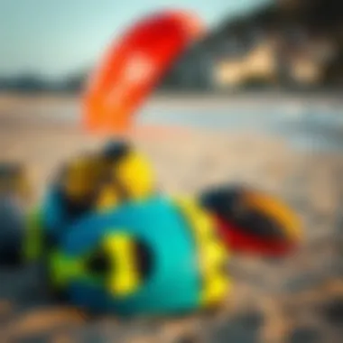 Essential Kiteboarding Gear on the Shore Vibrant kiteboarding gear ready for action on the sandy shore