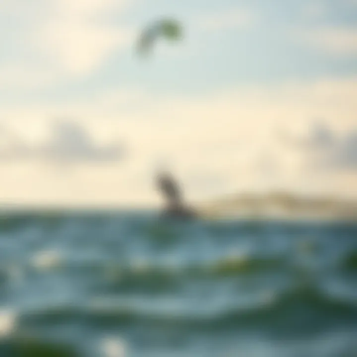 Kiteboarder Gliding Over Water An exhilarating moment of a kiteboarder gliding gracefully above the water surface