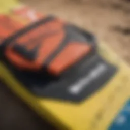 Close-up of a high-performance kiteboard footstrap showcasing its material and design.