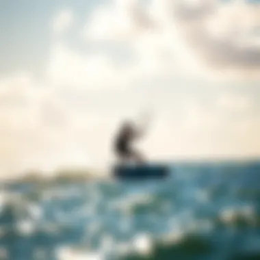 Kiteboarder in Action Kiteboarder riding on water with a wing foil kit in action