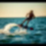Gliding Above the Water: The Thrill of Foiling Wakeboarding A dynamic foiling wakeboarder gliding above the water surface