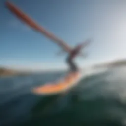 A wing surfer gliding across the water