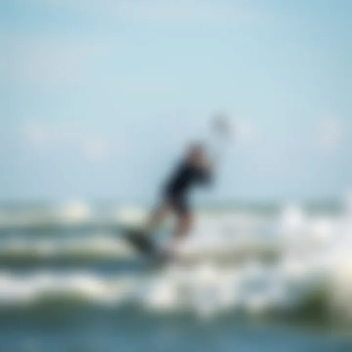 Kiteboarder navigating waves under a strong breeze