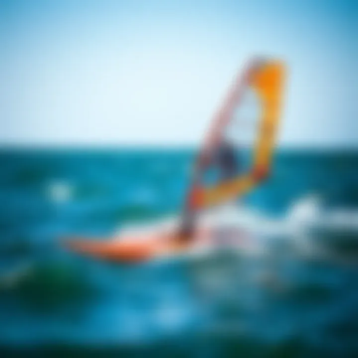 Hydrofoil windsurfing board gliding above the water surface