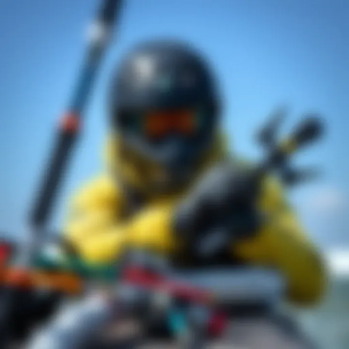 A kiteboarder assessing equipment damage after an accident