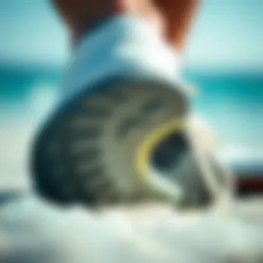 Close-up of Shoe Sole Details A close-up of the sole of a kite surfing shoe, highlighting its traction and durability.