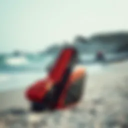 A stylish kiteboard golf bag showcased on a beach