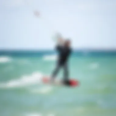 Kiteboarding Performance in a Wetsuit A kiteboarder in action wearing a wetsuit, demonstrating performance in water.