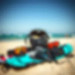 Complete kiteboarding kit displayed on the beach