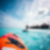 Gliding Over Turquoise Waters A kitesurfer gliding over turquoise waters in the Maldives