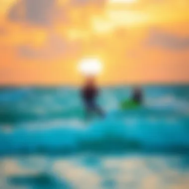 A vibrant sunset backdrop while kitesurfers enjoy the waves