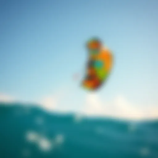 A vibrant kitesurfing kite soaring high above the ocean waves