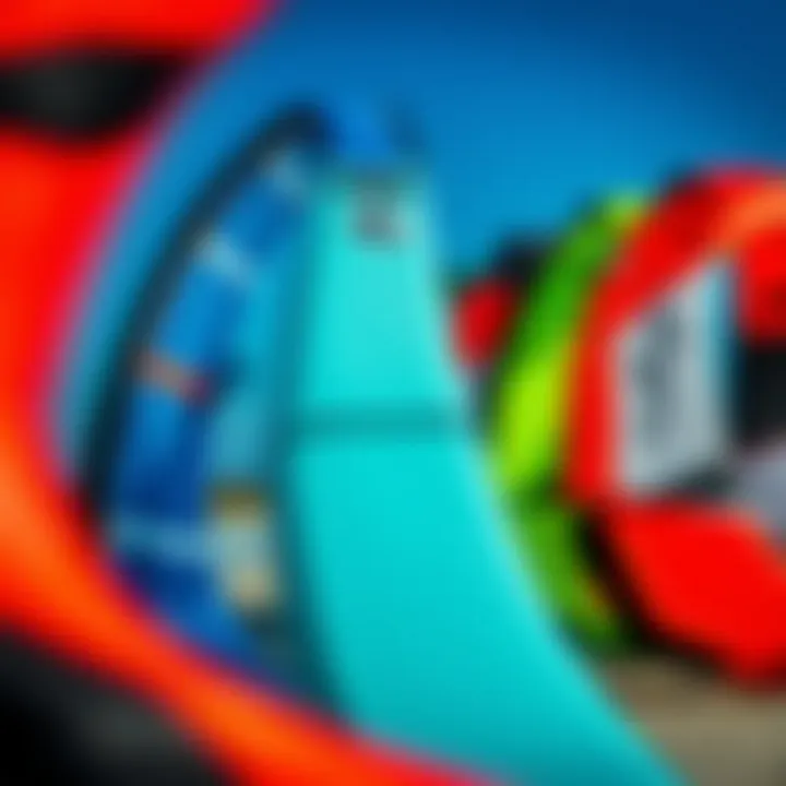 Explore Various Kitesurfing Kite Designs Close-up view of a range of kitesurfing kites displayed on the beach