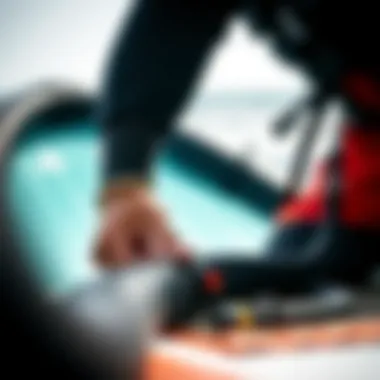 An athlete maintaining their sup pump hose for optimal performance