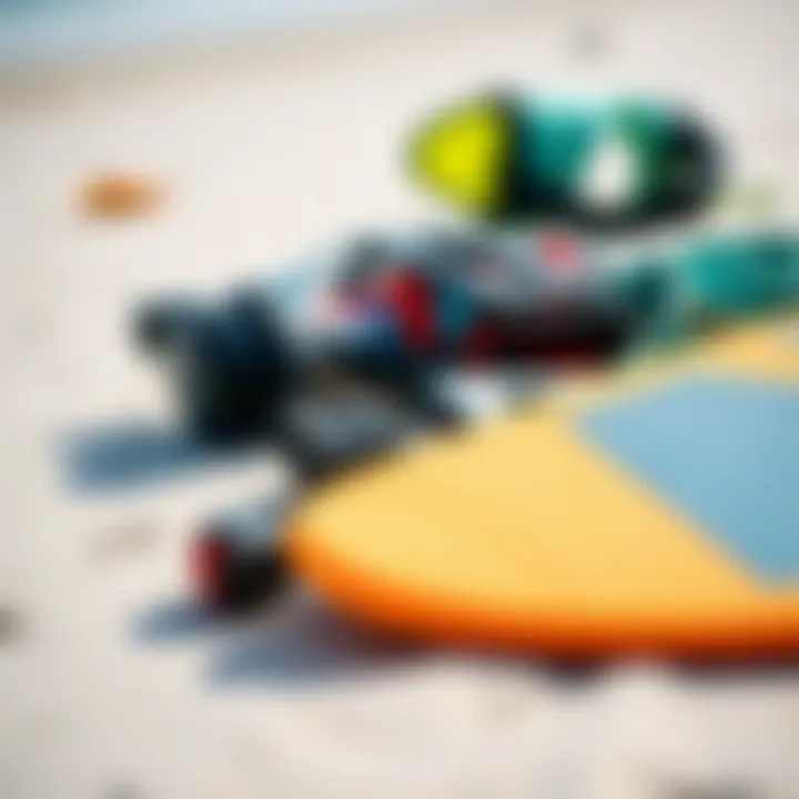 Close-up of high-performance kite surfing equipment laid on the beach