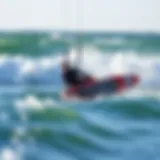 Dynamic Mystic kiteboard cutting through the waves