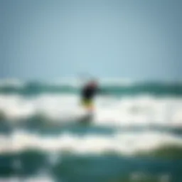 A kitesurfer skillfully navigating the waves