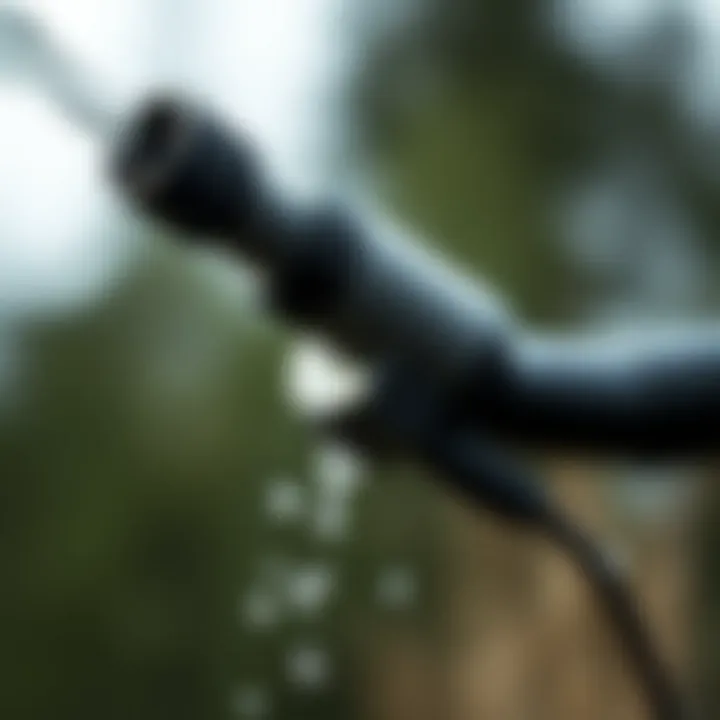 Close-up of RinseKit nozzle with water spray