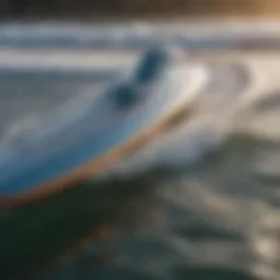 A close-up view of a surfboard with a hydrofoil, showcasing the intricate design and engineering.