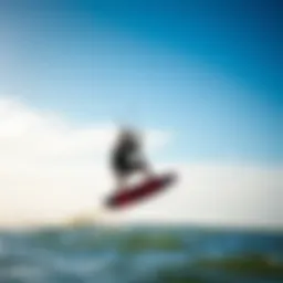 Dynamic action shot of the 2010 Slingshot kite in the air during a kiteboarding session