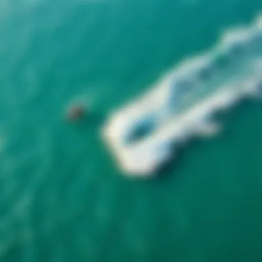 Aerial View of Kite Surfers Ride Aerial view of kite surfers riding the waves