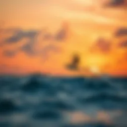 Kite surfing at sunset in the Maldives