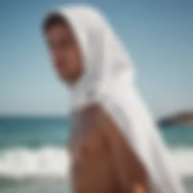Innovative Features of Surf Towels Close-up of unique features of a surf towel, such as pockets and hoods