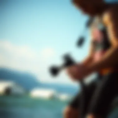 Kiteboarder Utilizing an Air Pump Nozzle Adapter A kiteboarder using a pump with a nozzle adapter in an outdoor setting