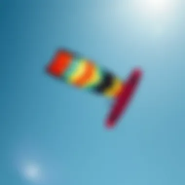 Harnessing the Power of Wind A vibrant kite soaring high with clear blue skies and optimal wind conditions.