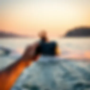 Rider Control with Efoil Remote Efoil remote in action on the water, demonstrating rider control.