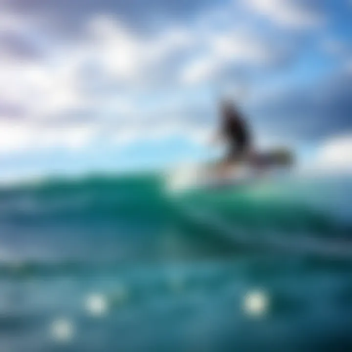 Kiteboarder riding a wave with a dynamic sky