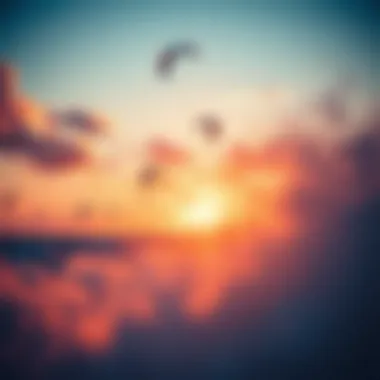 Vibrant sunset over the ocean with kites in the air