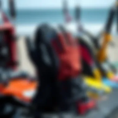 Wetsuit Mittens and Kiteboarding Equipment Wetsuit mittens displayed with kiteboarding gear